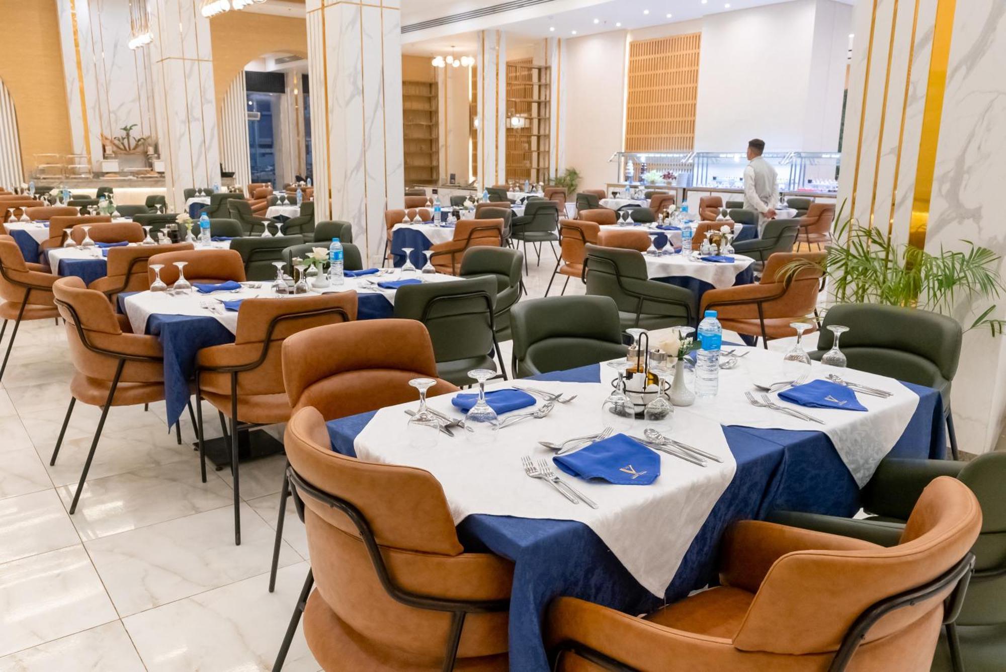 The V Luxury Resort Sahl Hasheesh Hurghada Exterior photo The restaurant at the hotel